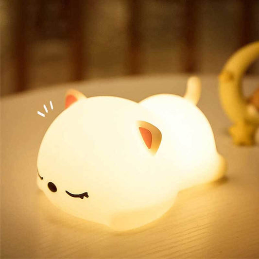Adorable sleepy cat LED night light for kids' rooms, emitting a soft glow for a soothing sleep aid.
