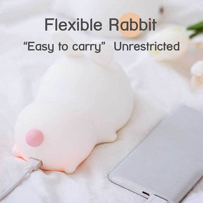Soft-touch sleepy cat LED night light, portable and ideal for a comforting glow in any kids' space.