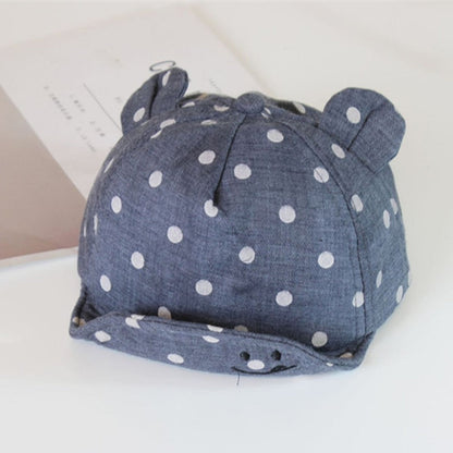 Adorable toddler cotton polka dot sun hat in pink for summer, offering sun protection for babies.
