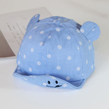 Unisex baby sun hat, 100% cotton with blue polka dots, perfect breathable infant headwear.