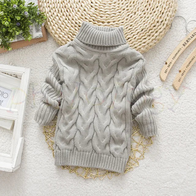Playful bear design on a knit turtleneck sweater for children's warm clothes.