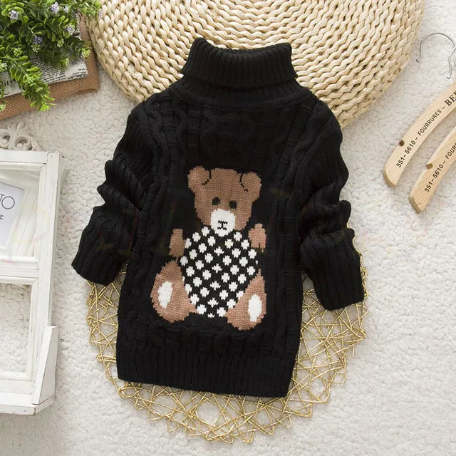 Soft knitwear teddy bear turtleneck sweater for toddlers, ensuring snug winter warmth.