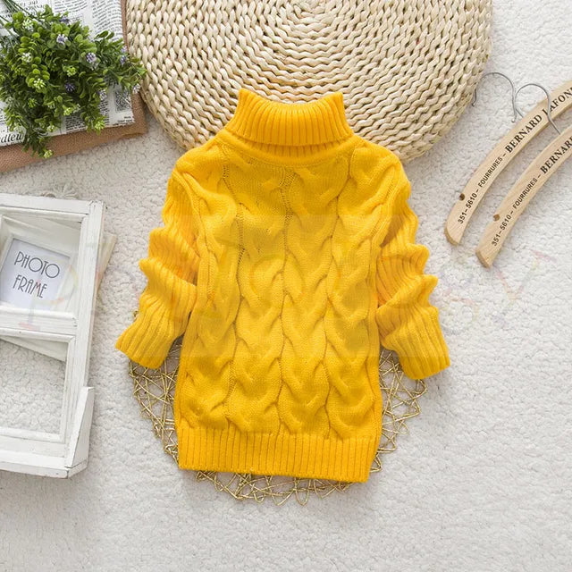 Stylish children's teddy bear turtleneck sweater in a soft knit, great for cold days.