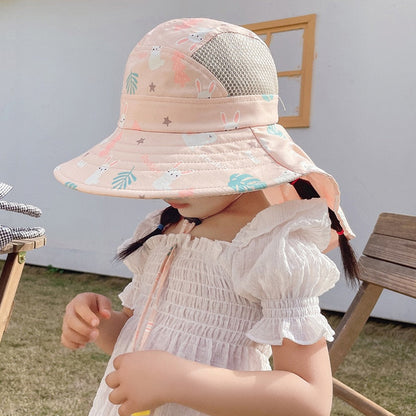 Adorable toddler in a wide-brim sun hat, perfect for UV protection on beach days and summer play
