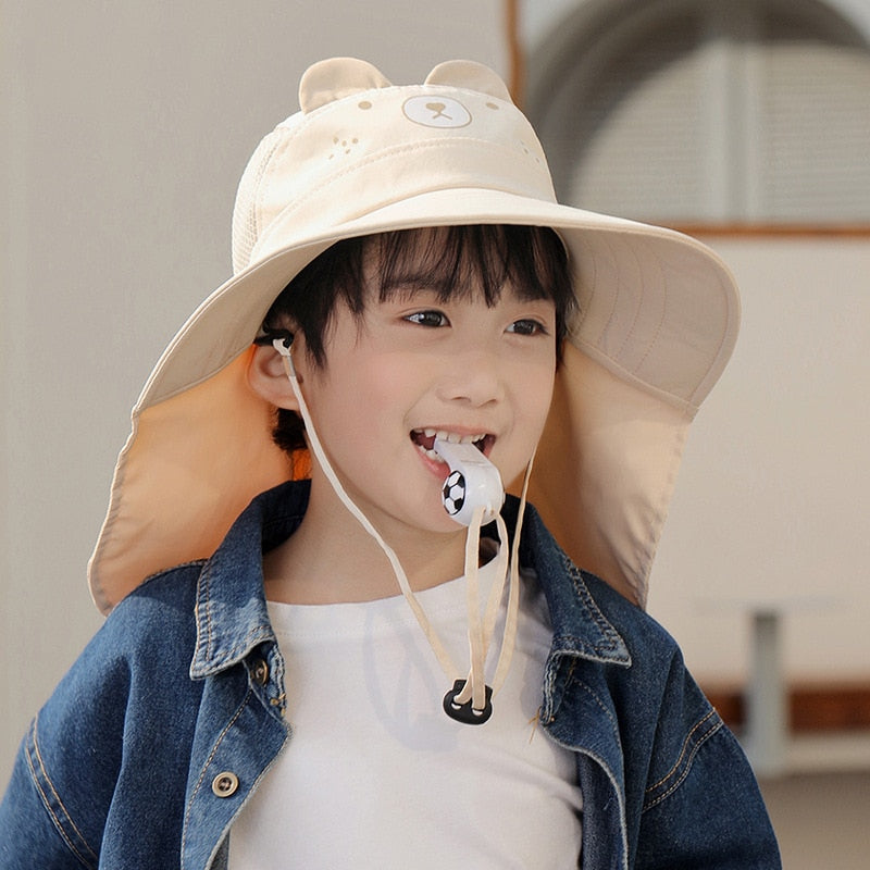 Close-up of a blue kids' wide-brim sun hat, featuring an adjustable chin strap for secure fit and UV protection