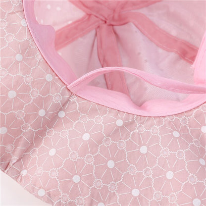 Detail of adjustable chin strap on a blue kids' cotton sun hat, ensuring a snug fit for beach days.