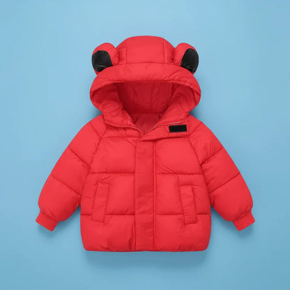 Child smiling in a comfortable hooded winter jacket with bunny ears, perfect for play.