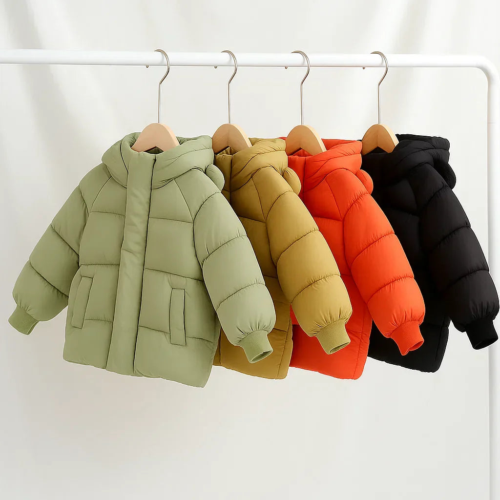 Closeup of soft hooded toddler jacket featuring cute bunny ear detail, perfect for winter.