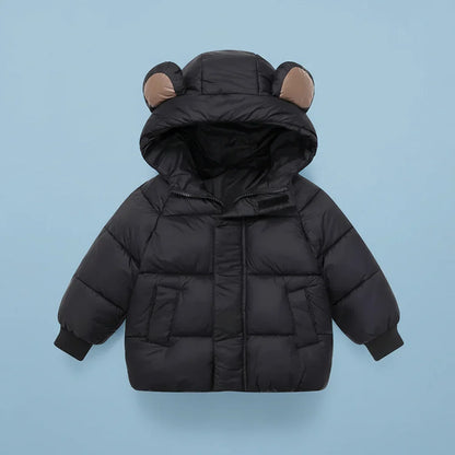 Texture shot of the fabric of the toddler winter coat, showing its warm, padded quality.