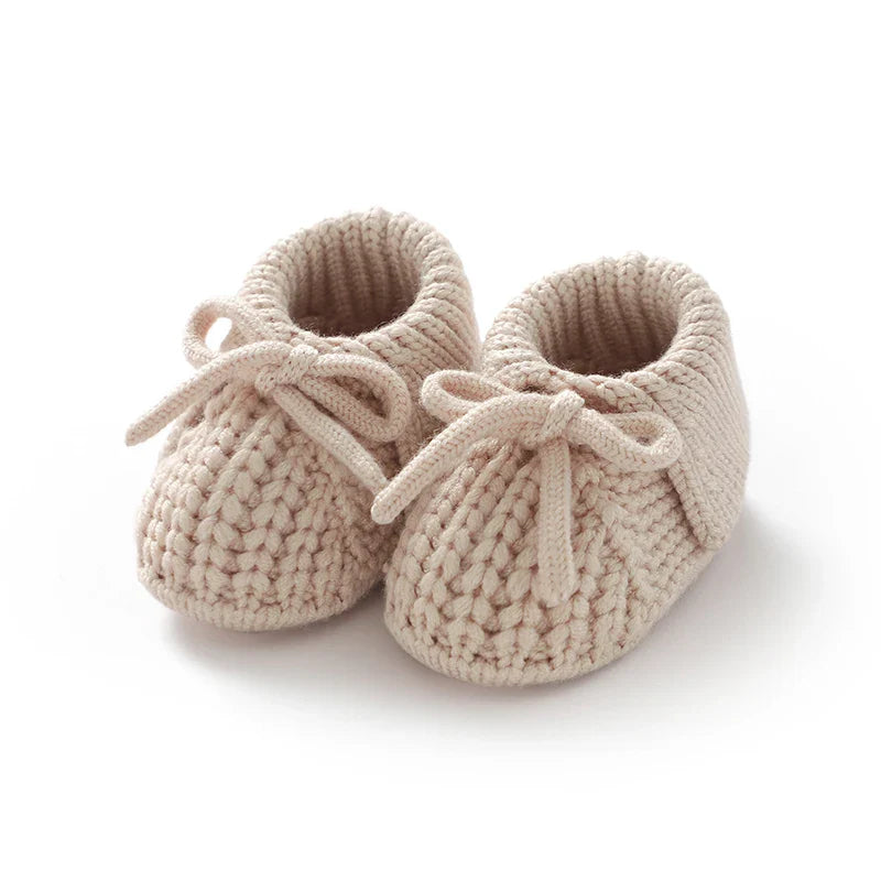 Adorable white knitted baby booties, soft handmade crib shoes for infants 0-18 months, cozy newborn footwear