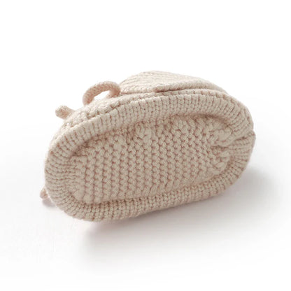 Pair of pink knitted baby booties, cozy handmade infant footwear, perfect newborn shoes 0-18 months