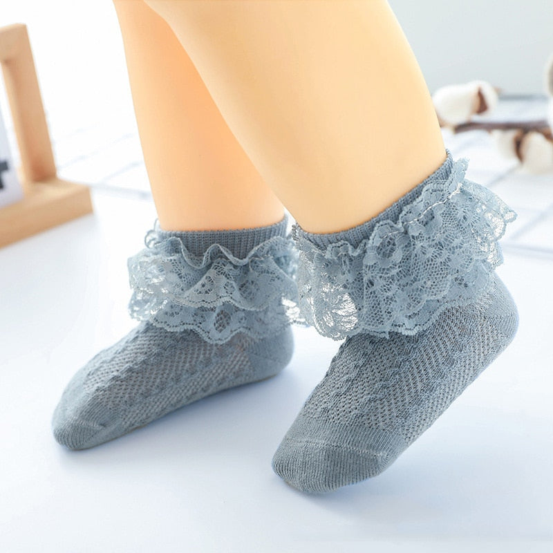 Girls' fancy white lace ruffle ankle socks, made from breathable cotton