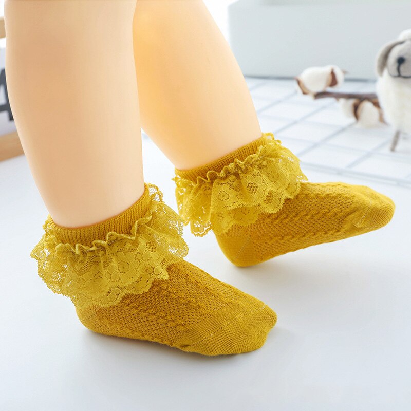 Variety pack of cotton lace ruffled ankle socks in pastel colors for girls