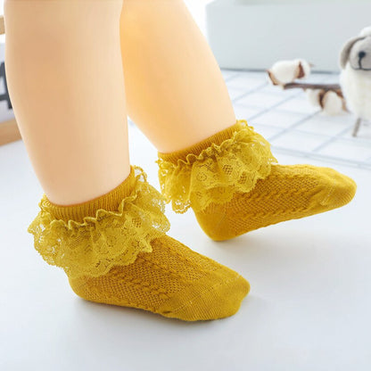 Variety pack of cotton lace ruffled ankle socks in pastel colors for girls