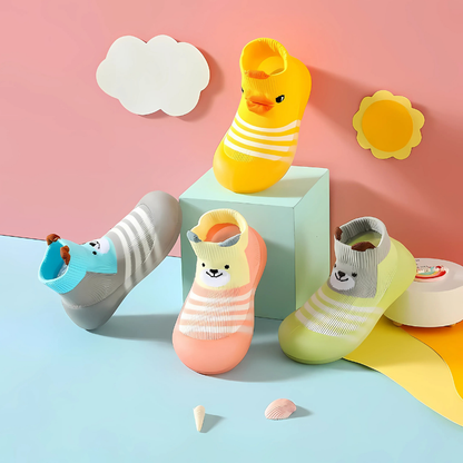 Adorable yellow duck baby anti-slip slipper socks for comfortable first steps and toddler play on any surface.