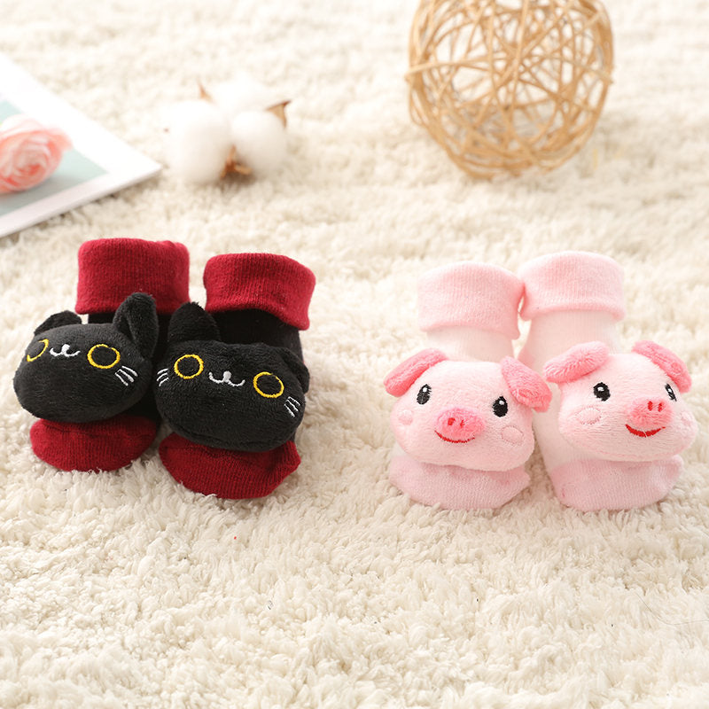 Baby anti-slip socks featuring a cheerful lion, soft cotton infant footwear for warmth and safety.