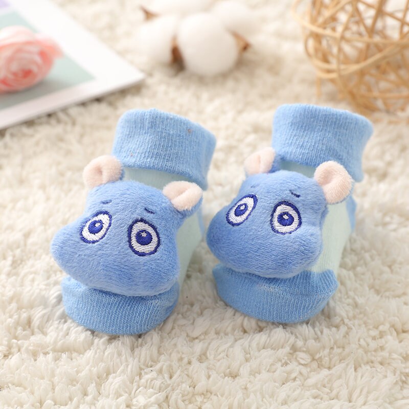 Green frog anti-slip cotton socks for infant boys and girls, safe baby footwear for crawling.