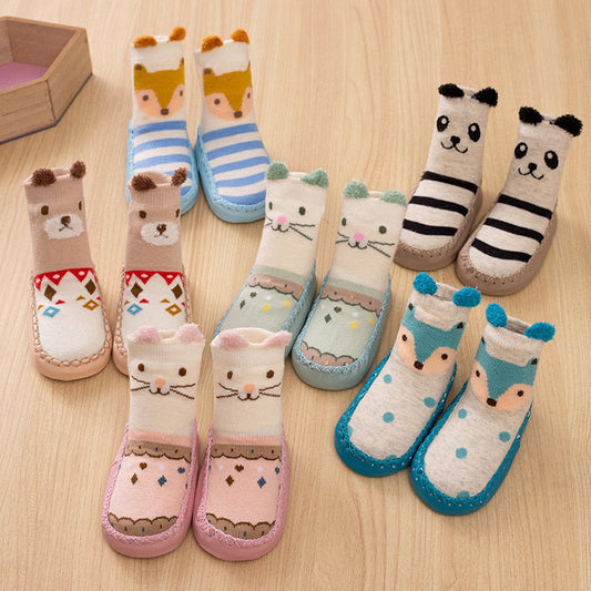 Adorable yellow duck baby anti-slip socks, perfect for warm and safe first steps for infants and toddlers.