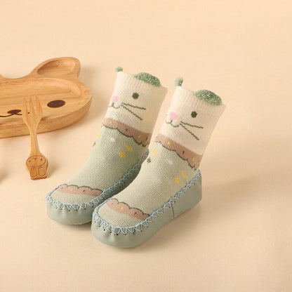 Set of assorted animal anti-slip baby socks, perfect for gifting to new parents for their baby's footwear.