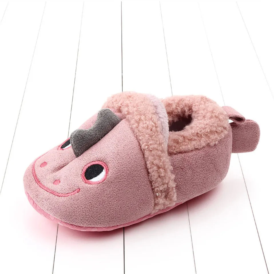Assortment of vibrant baby animal non-slip slippers, great for gifting.