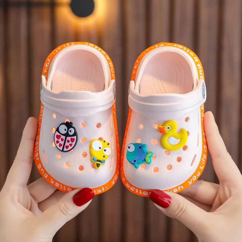 Adorable yellow duck children's anti-slip summer slippers with back strap for toddlers, PVC material.
