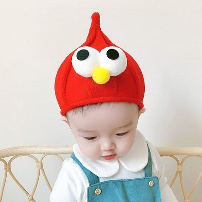 Adorable yellow kids winter beanie with large googly eyes, perfect for a unisex toddler.