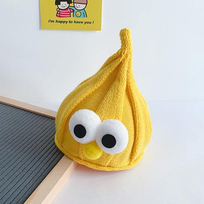 Pile of assorted color googly eyes beanies, showcasing options for unisex kids winter hats.