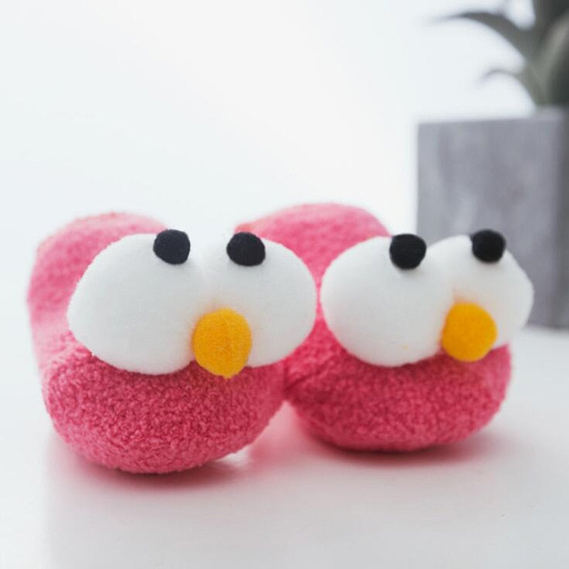 Cute blue big eye baby boat socks made of breathable cotton, perfect for infant's sensitive skin.
