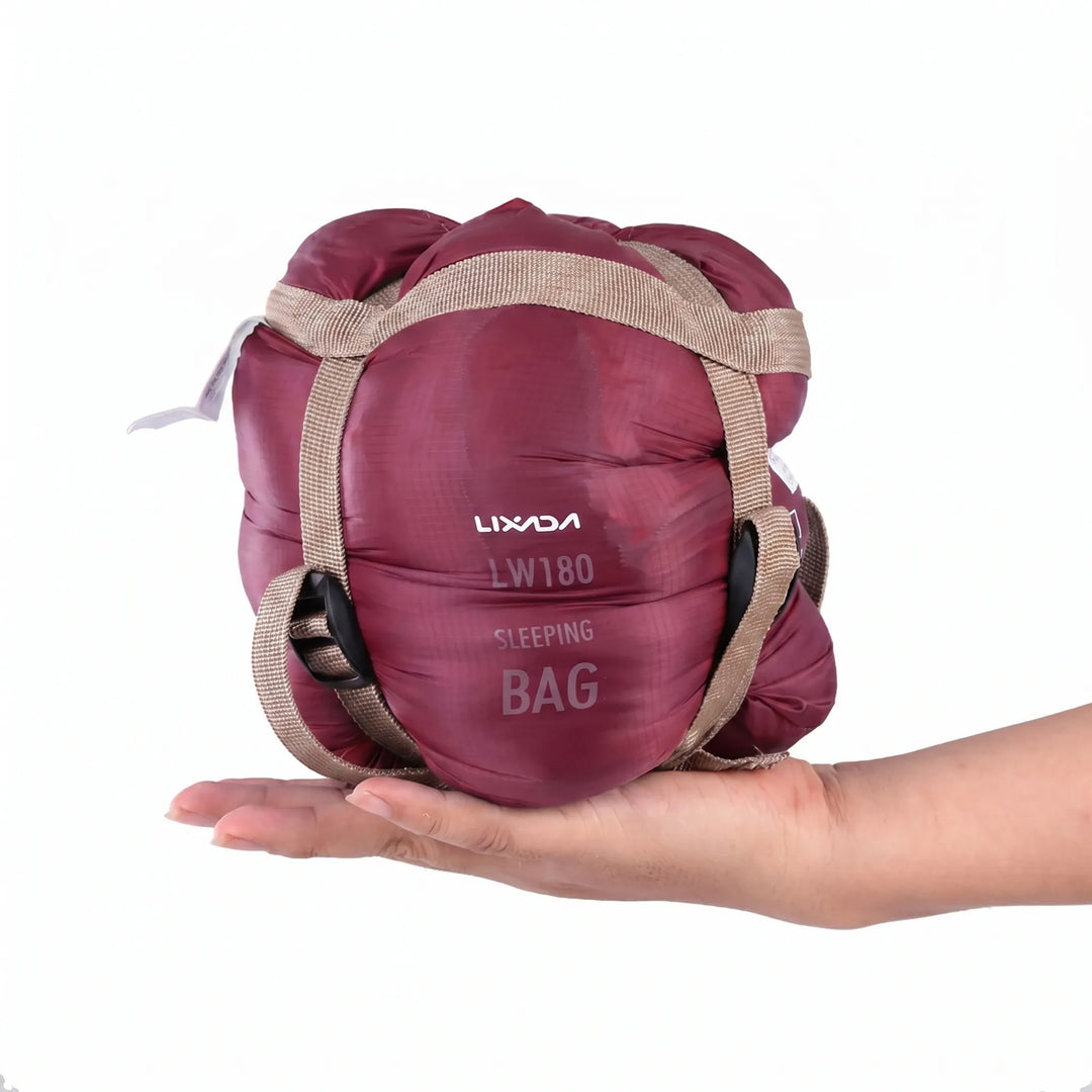 Compact ultralight sleeping bag for adult hikers and campers, essential outdoor travel gear.