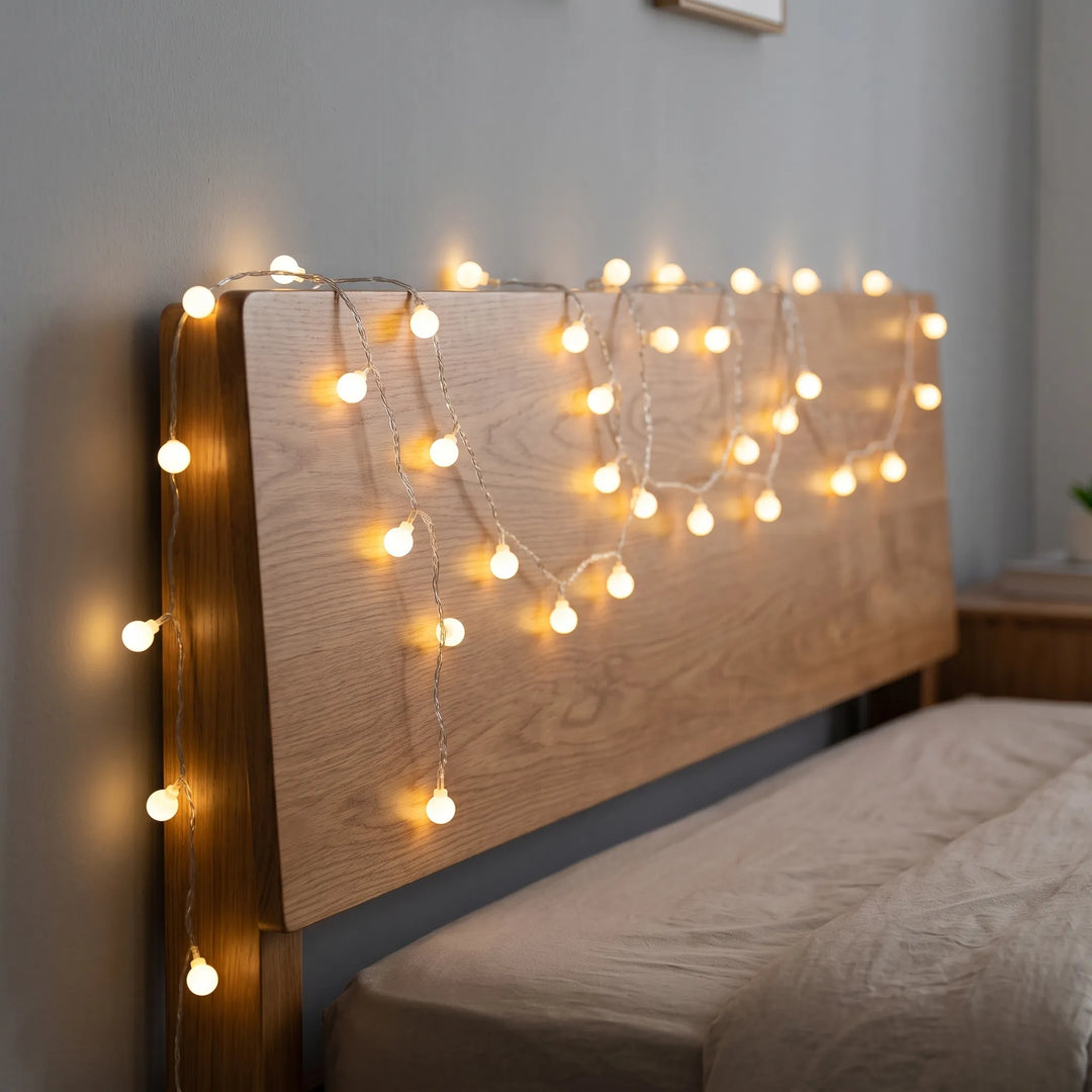 Ambient Globe LED string lights for indoor & outdoor decor. Perfect for parties, patios, or bedroom mood lighting.