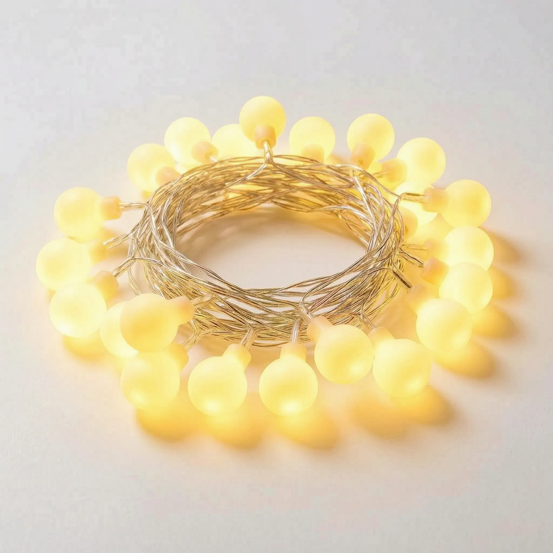 Versatile Ambient Globe LED string lights for indoor & outdoor decor, ideal as fairy lights or festive party lighting.