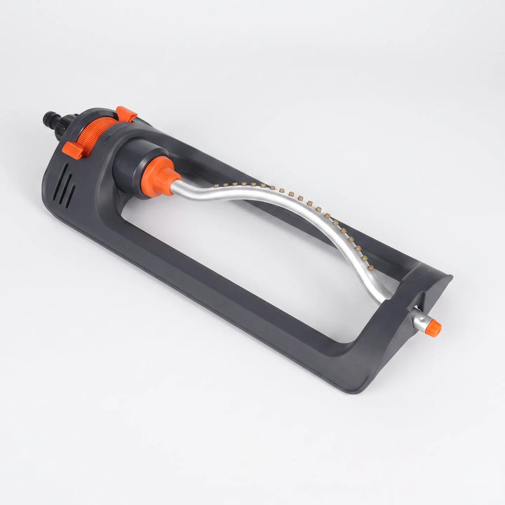 Oscillating garden sprinkler for wide area lawn watering and easy yard maintenance. Home & garden use.