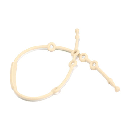 Multiple adjustable silicone toy straps displayed on a white background, highlighting different colors.