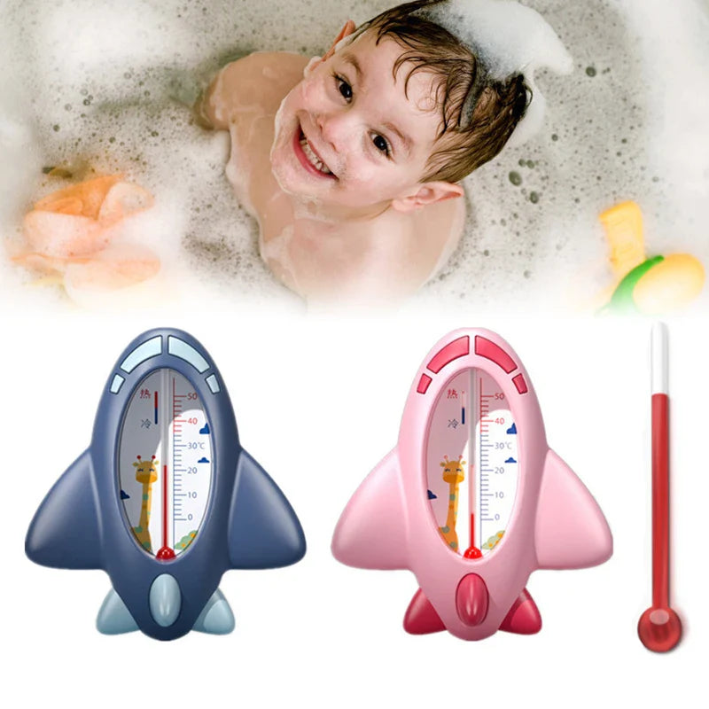 White and blue aircraft bath thermometer, a crucial baby safety accessory for parenting.