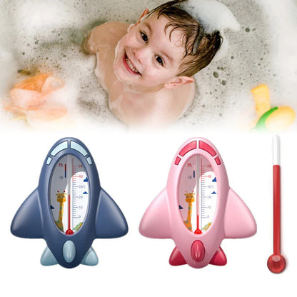 White and blue aircraft bath thermometer, a crucial baby safety accessory for parenting.