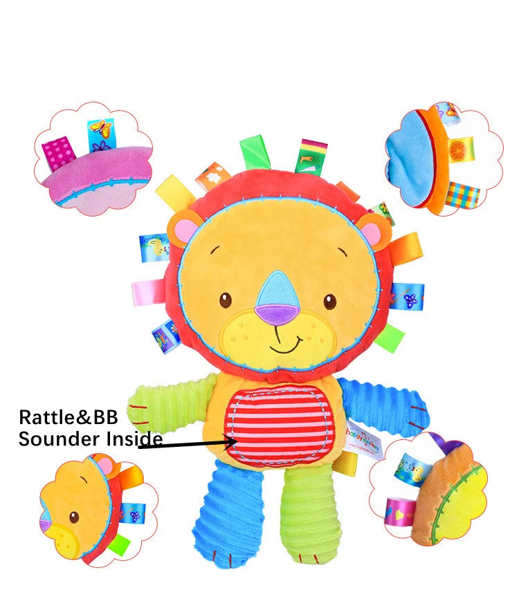 Close-up of soft elephant plush toy with sensory rattles and bells for babies