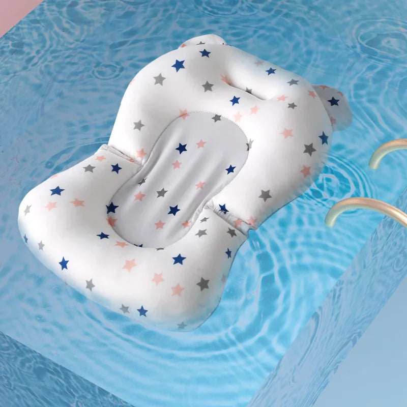Soft baby bathtub support cushion, anti-slip design ensures newborn safety during bathing.