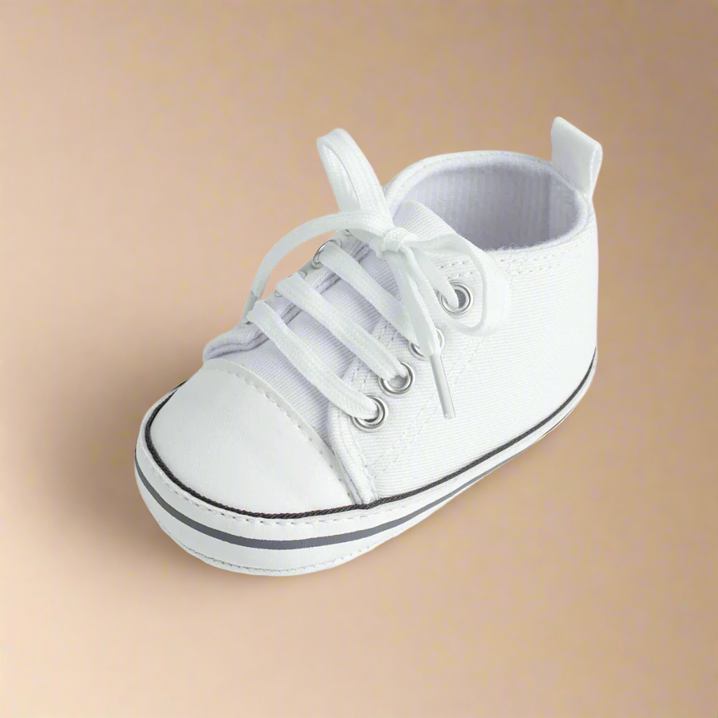 Child's first stride in anti-slip canvas sneakers, soft sole providing natural barefoot feel