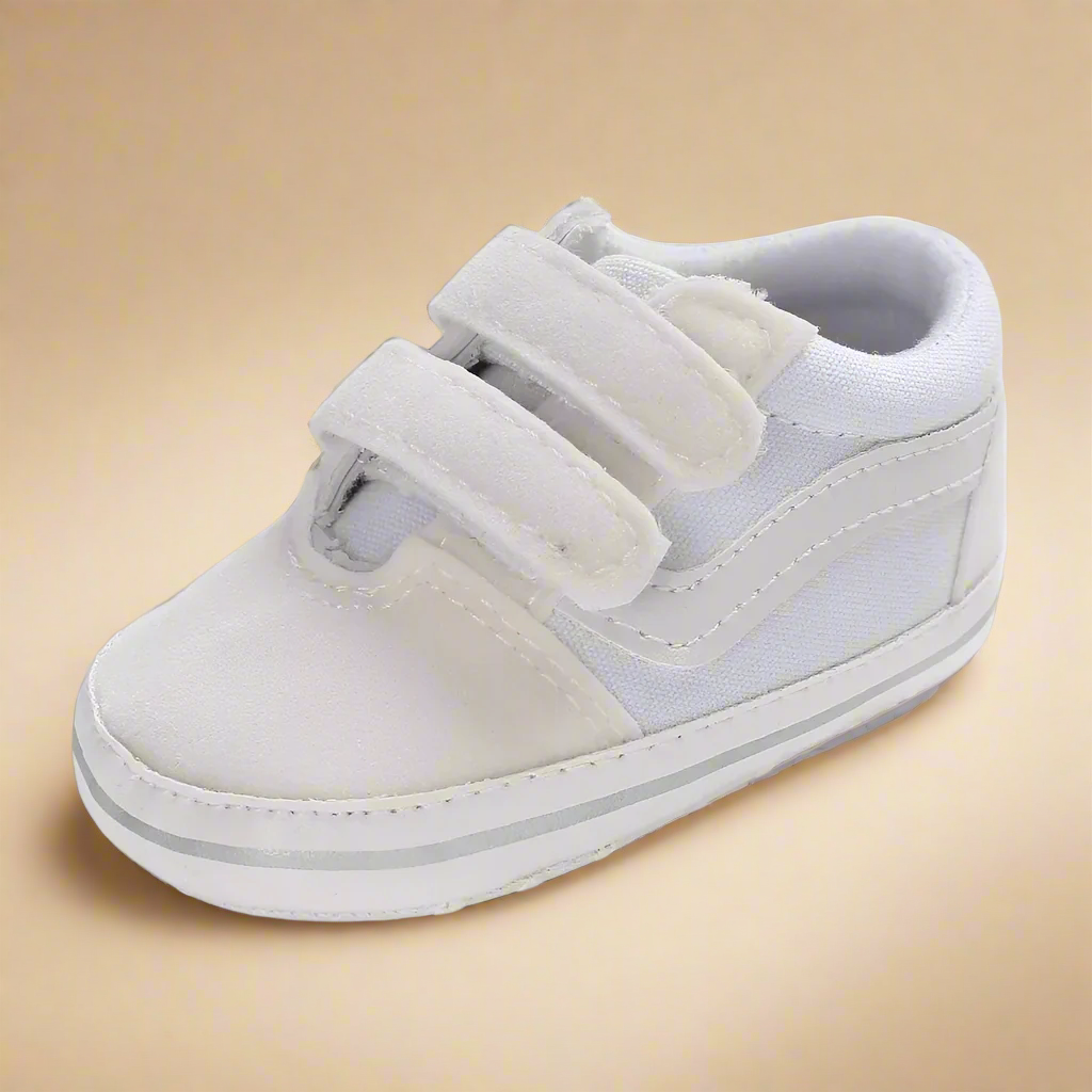 Baby anti-slip canvas sneakers in multiple colors, featuring soft soles and velcro closures