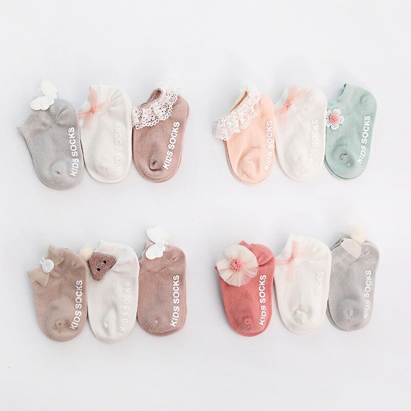 Overhead view of multi-colored anti-slip grip socks for babies, toddlers, essential children's apparel