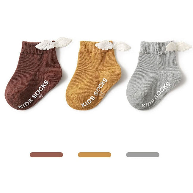 Assorted pack of colorful anti-slip cotton grip socks for babies & toddlers, soft and durable