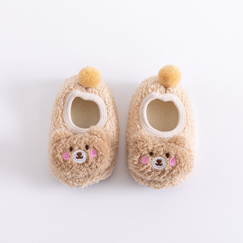 Soft cotton baby socks with anti-slip soles and sweet bear motif, ideal for infants