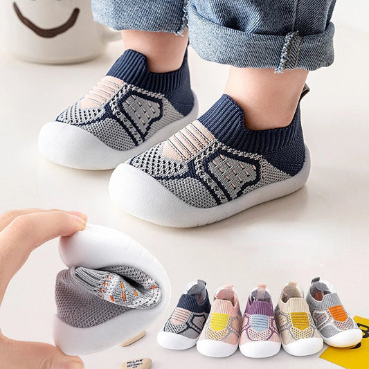 Baby Anti-Slip First Walker Shoes, soft sole, breathable, in pastel pink for infant girls.