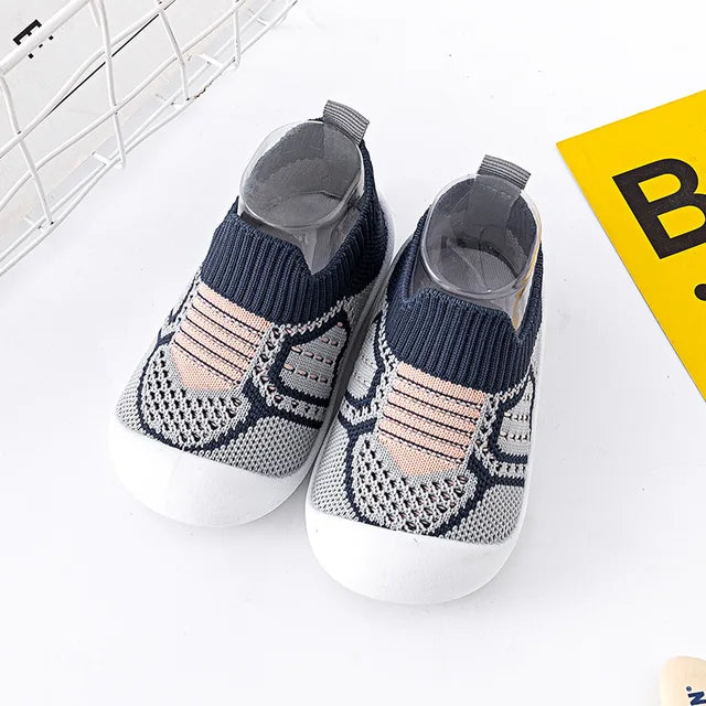 Open view of Baby Anti-Slip First Walker Shoe, highlighting its wide opening for easy wear.