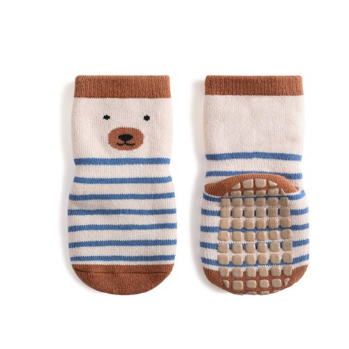 Close-up of baby anti-slip floor socks showing grippy sole for safe crawling.