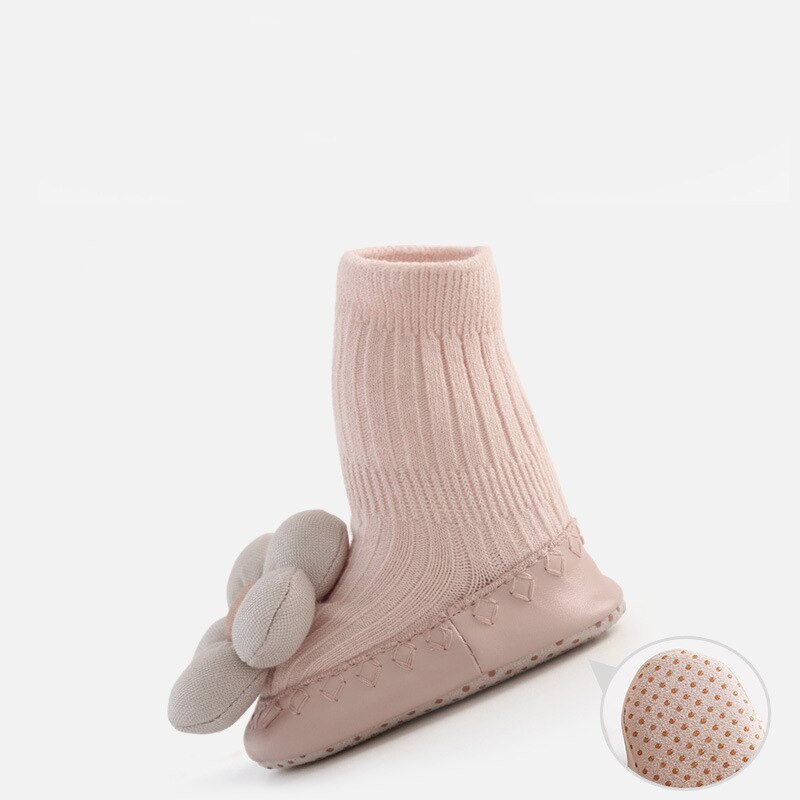 Anti-slip toddler shoes, featuring a high-neck for warmth and support, perfect as baby presents.