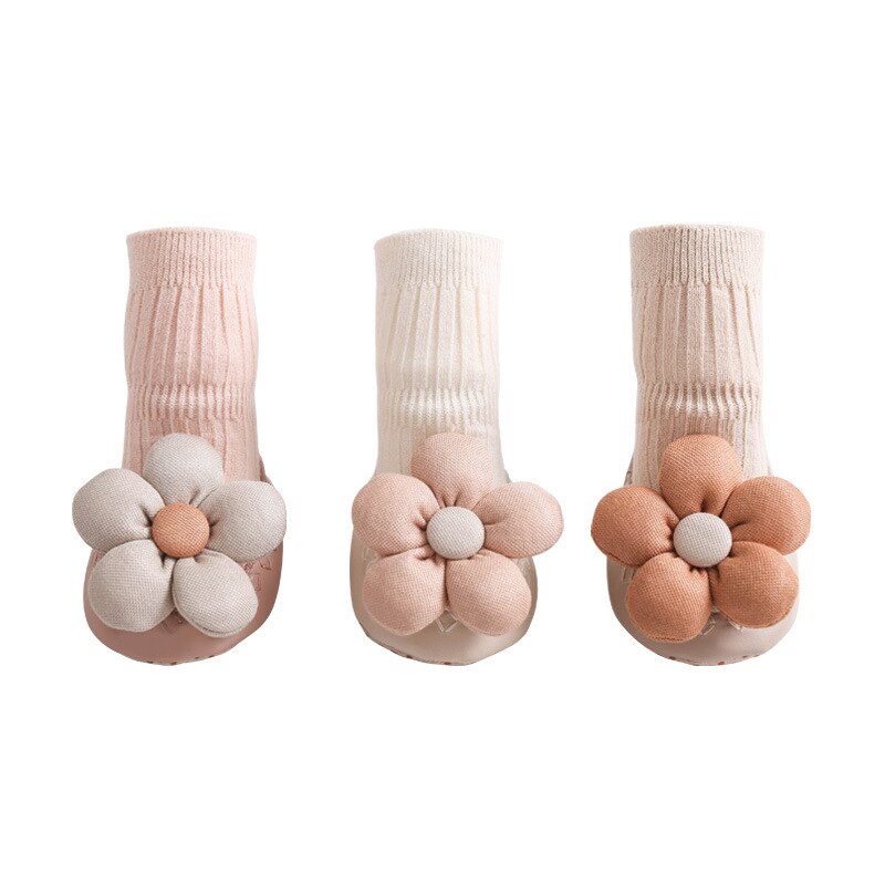Soft cotton high-neck anti-slip baby shoes, designed for toddlers, promoting safe first steps.