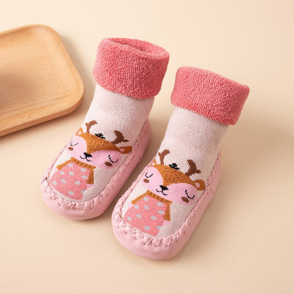 Anti-slip baby socks featuring colorful geometric patterns, ideal for crawling