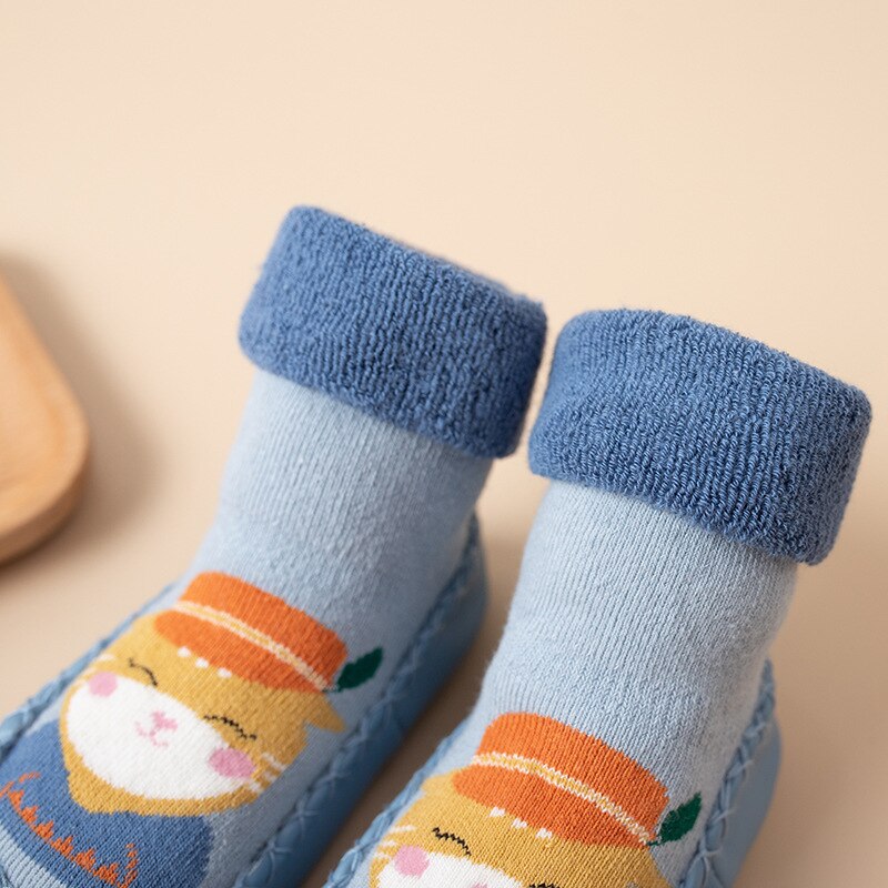 Soft knit baby socks with striped patterns and anti-slip dots for beginning walkers