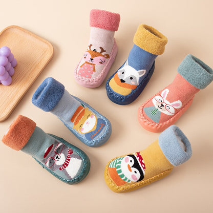 Toddler anti-slip socks with playful character patterns and secure non-slip bottom